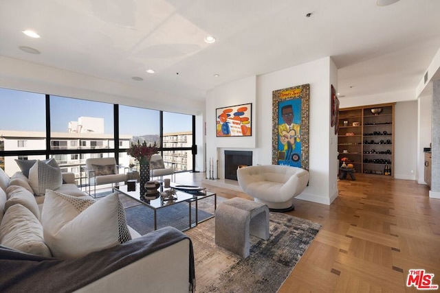 living room featuring light parquet flooring