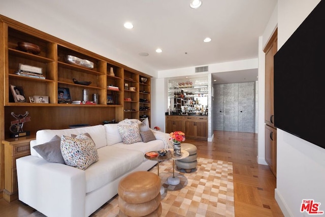 living room with light parquet flooring