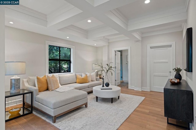 living room featuring coffered ceiling, light hardwood / wood-style flooring, and beamed ceiling