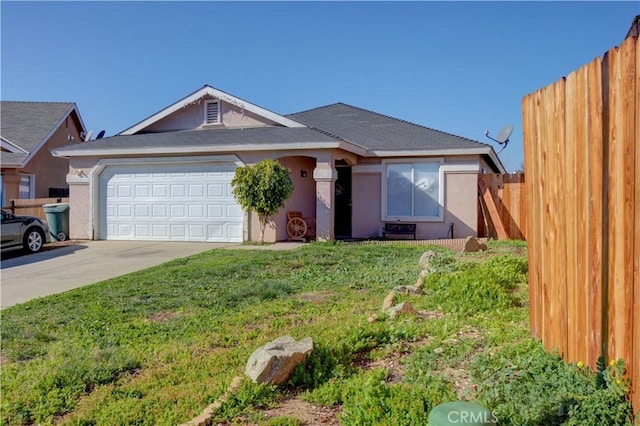 ranch-style house with a garage and a front lawn