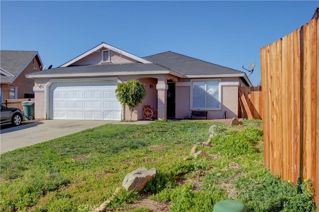 ranch-style home with a garage and a front yard