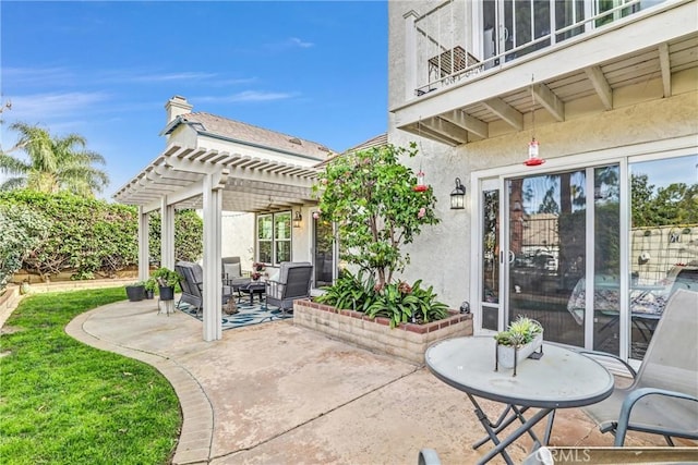 view of patio featuring an outdoor living space, a pergola, and a balcony