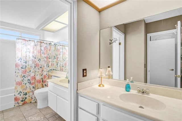 full bathroom with toilet, tile patterned floors, vanity, and shower / tub combo