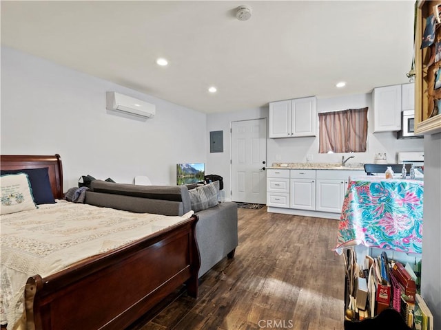 kitchen featuring white cabinets, dark wood-type flooring, sink, electric panel, and a wall mounted air conditioner