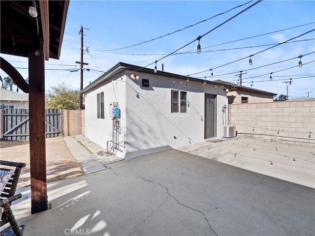 back of property featuring a patio area