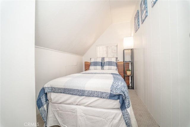 bedroom featuring vaulted ceiling