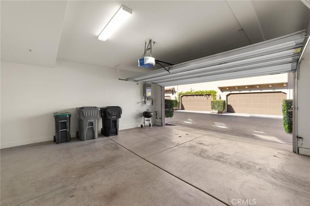 garage featuring a garage door opener