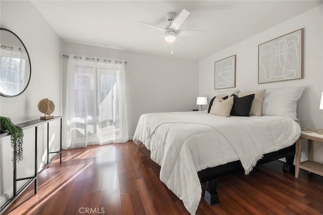 bedroom featuring ceiling fan and dark hardwood / wood-style floors