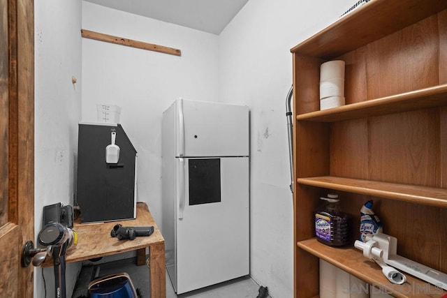 interior space with white fridge