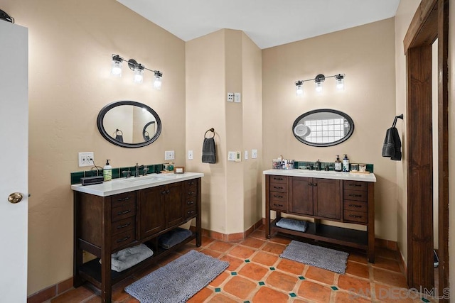 bathroom featuring vanity and tile patterned flooring