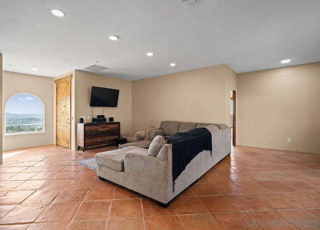 living room with light tile patterned floors