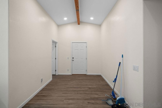 hallway featuring dark hardwood / wood-style floors, beamed ceiling, and high vaulted ceiling