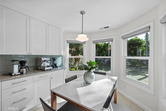 dining room with light tile patterned floors