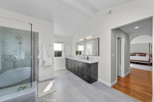 bathroom with hardwood / wood-style floors, vaulted ceiling with beams, an enclosed shower, and vanity