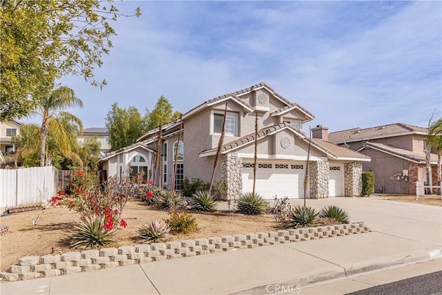 view of front of property with a garage