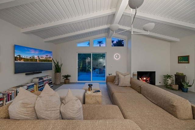 living room featuring vaulted ceiling with beams