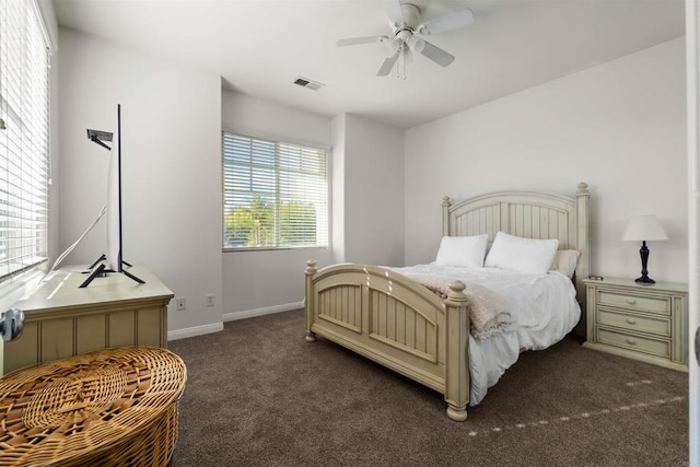 bedroom featuring dark colored carpet and ceiling fan