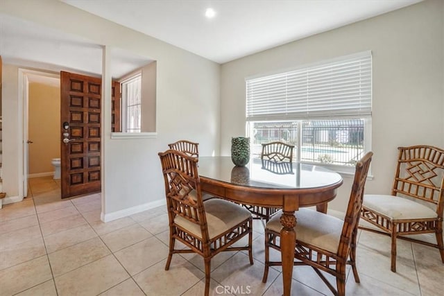 dining room featuring light tile patterned flooring