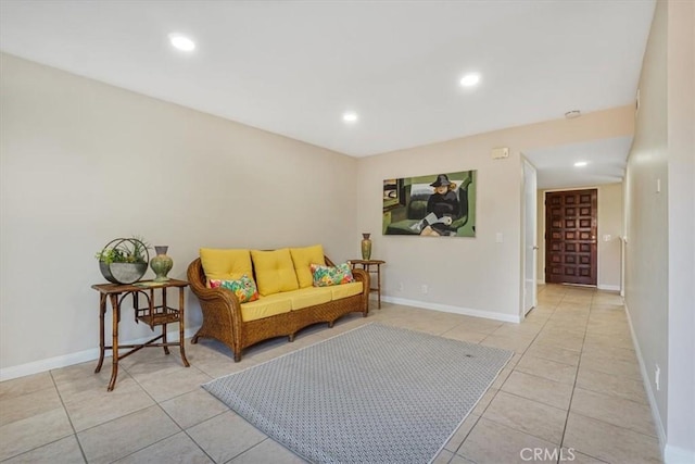 sitting room with light tile patterned floors