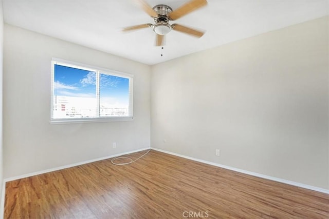 unfurnished room featuring wood-type flooring and ceiling fan