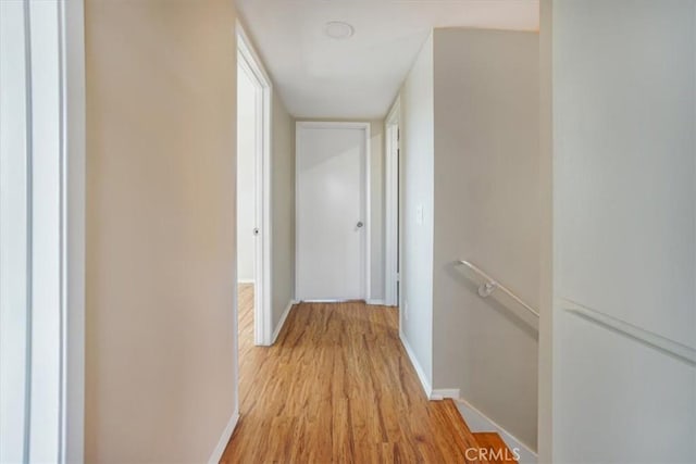 corridor featuring light hardwood / wood-style flooring