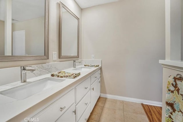 bathroom featuring vanity and tile patterned flooring