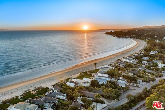 property view of water featuring a beach view