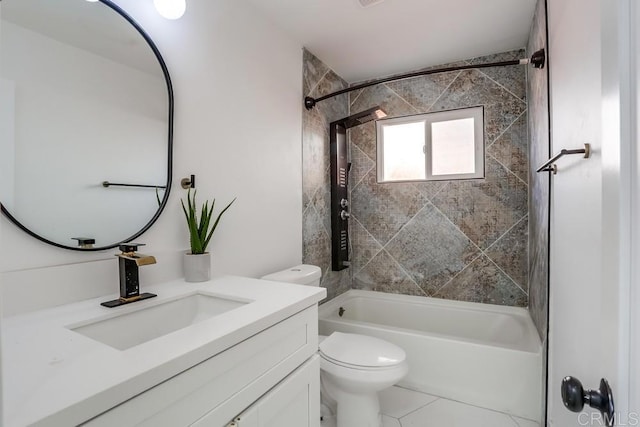 full bathroom featuring tiled shower / bath combo, toilet, tile patterned flooring, and vanity