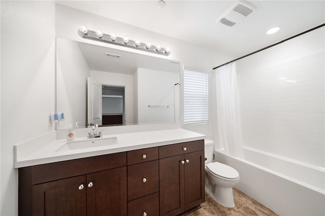 full bathroom with vanity, toilet, and shower / bath combo with shower curtain