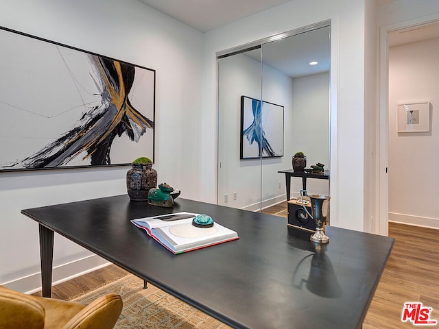 office area with hardwood / wood-style floors