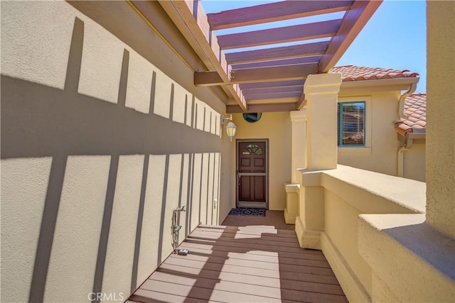 6279 Twinberry Cir Unit 7, Avila Beach, CA 93424 - view of exterior entry with stucco siding and a tiled roof