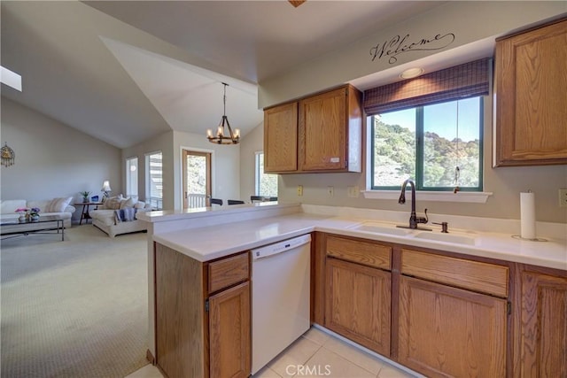 6279 Twinberry Cir Unit 7, Avila Beach, CA 93424 - kitchen featuring dishwasher, open floor plan, brown cabinetry, a peninsula, and light countertops