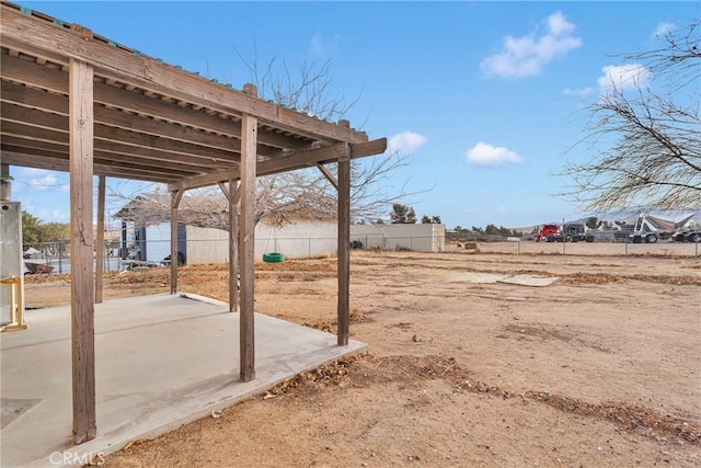 view of yard with a patio area and fence