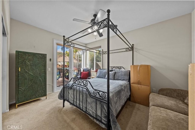 bedroom featuring ceiling fan, carpet flooring, and access to outside