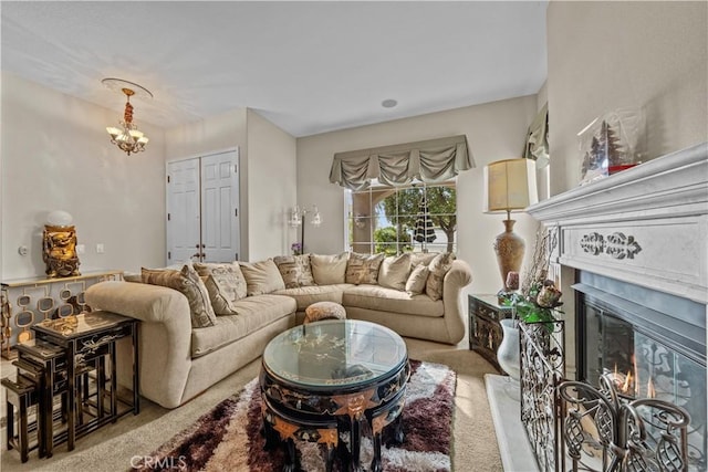 carpeted living room featuring a notable chandelier