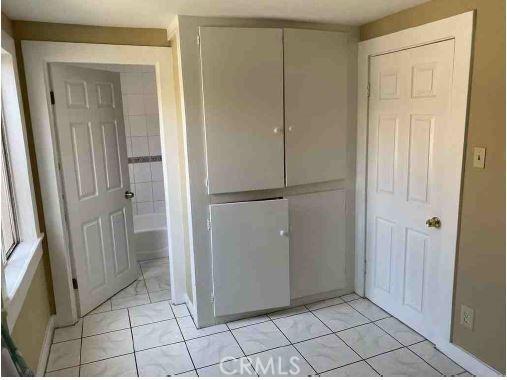 interior space featuring tile patterned flooring