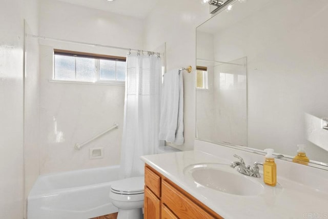 full bathroom featuring vanity, toilet, and shower / bath combo