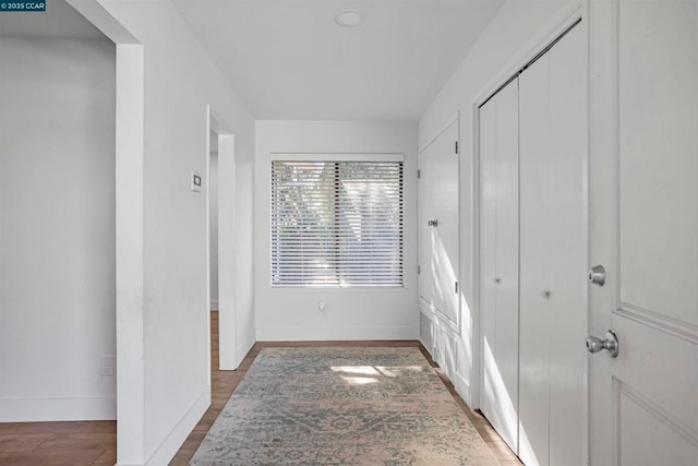 hallway featuring hardwood / wood-style flooring