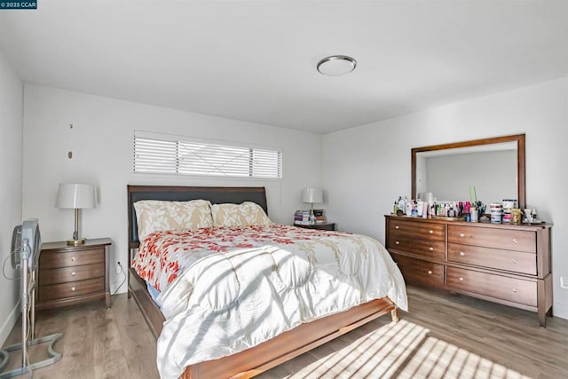 bedroom featuring light hardwood / wood-style floors