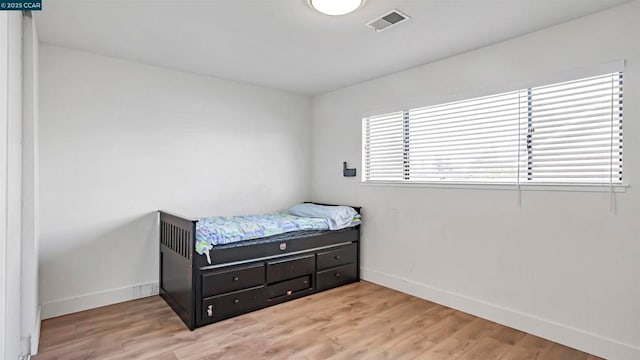 bedroom featuring light hardwood / wood-style flooring