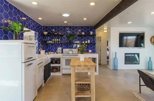 bar featuring white cabinetry, white appliances, and beamed ceiling