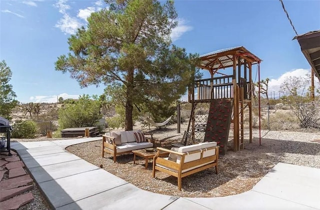 view of play area featuring an outdoor living space