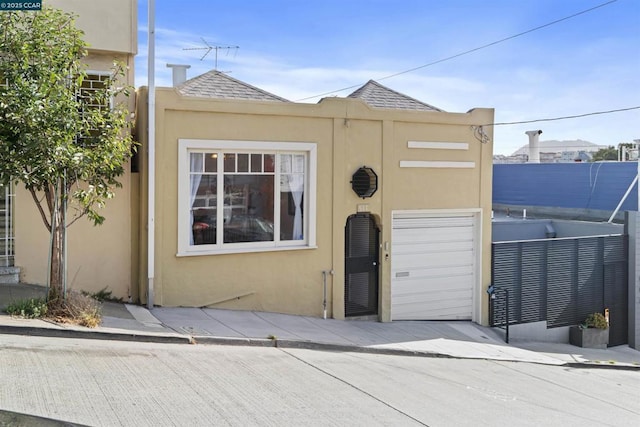 view of front of home featuring a garage