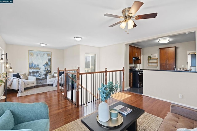 living room with dark hardwood / wood-style floors