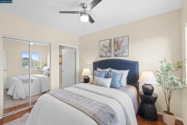 bedroom with ceiling fan, hardwood / wood-style floors, and a closet