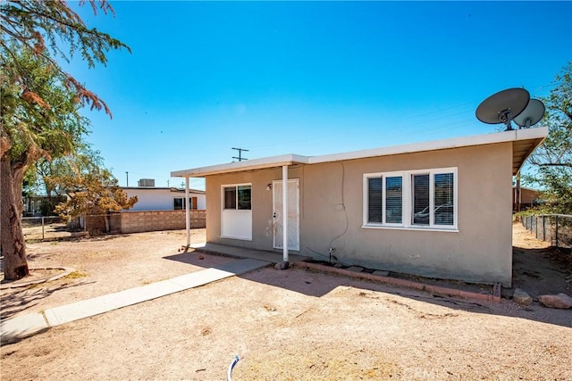 view of front of property with a patio area