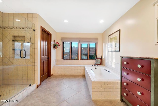 bathroom with plus walk in shower and tile patterned floors