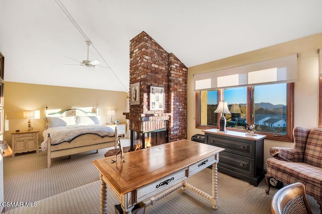 carpeted bedroom with lofted ceiling