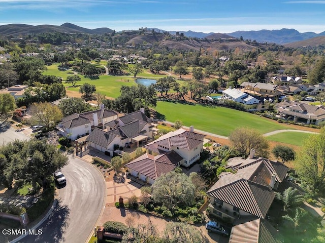 aerial view with a water and mountain view