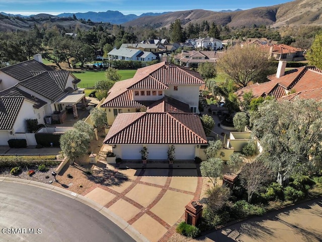 drone / aerial view featuring a mountain view